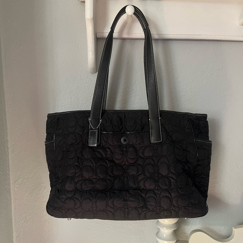 Coach baby bag/ diper bag (diaper pad pictured last is included)